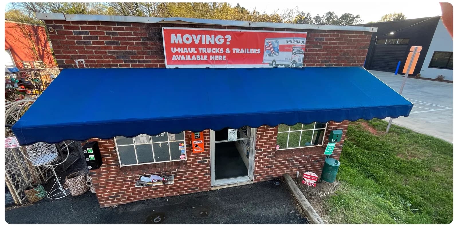 Clean commercial storefront after Stand Out Exterior commercial pressure washing in Denver NC