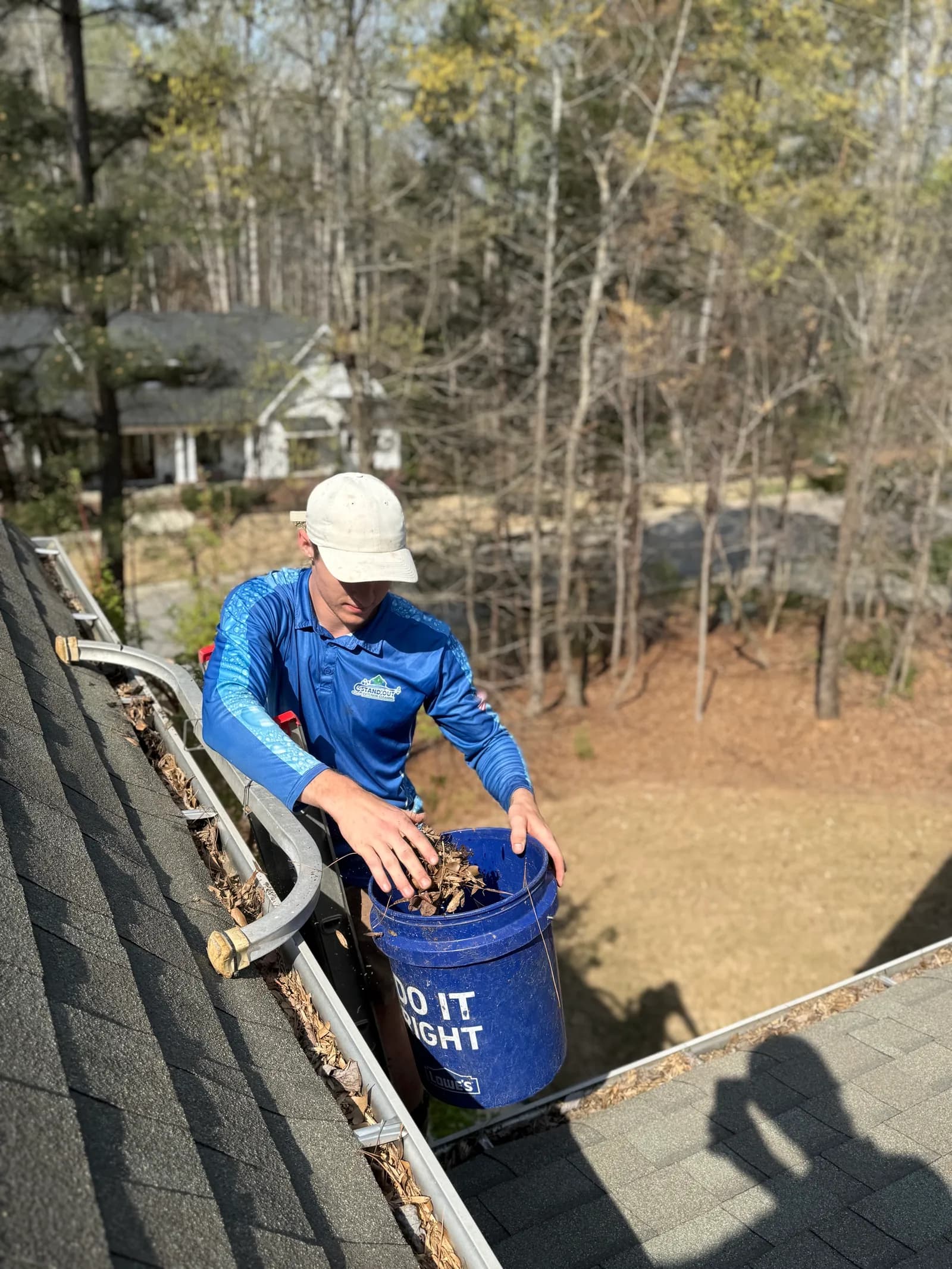 Ridge Curwood cleaning gutters by hand in Denver NC