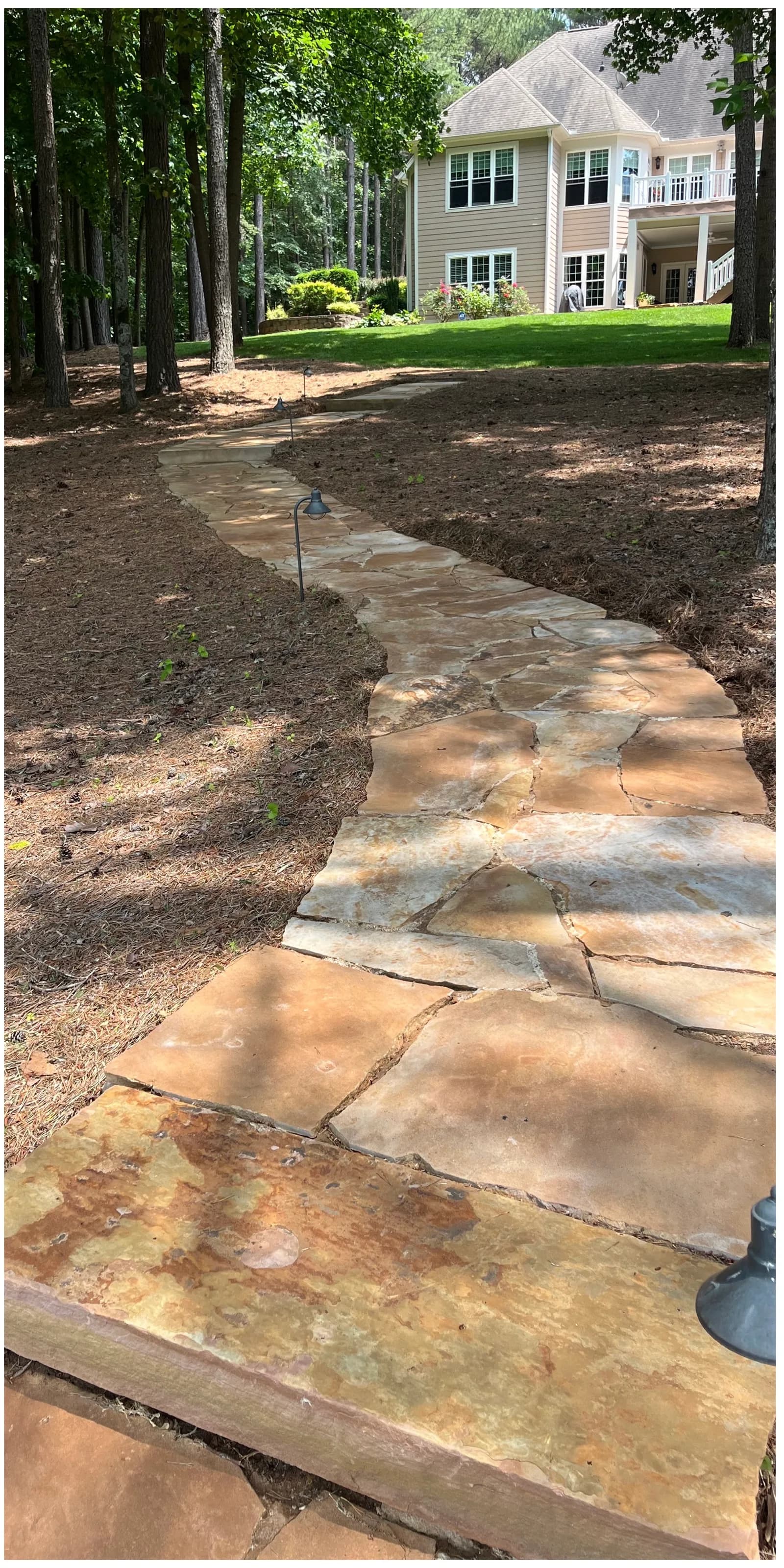 Restored stone paver walkway after deep cleaning and sealing in Lake Norman NC